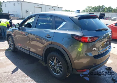 2021 Mazda Cx-5 Touring z USA, uszkodzony, nr VIN JM3KFBCM6M1338205